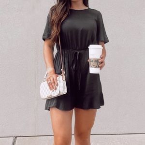 Appears black, but actually really dark navy. Size large. New with tags.